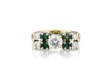 A 14K Gold Diamond and Emerald Ring