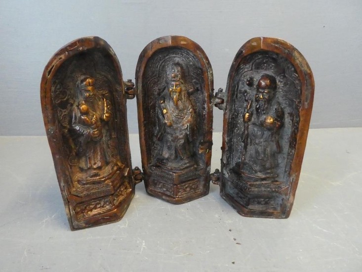 3 Bronze figures of deities inside a hinged case 14.5H x 22W...