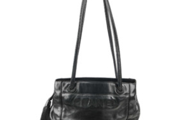 CHANEL - a vintage lambskin leather handbag. View more details