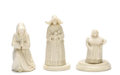 The kneeling monk, Sister of Charity and The French Cook: three early Kerr and Binns parian extinguishers and two stands
