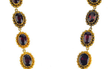 A late Victorian garnet necklace. View more details