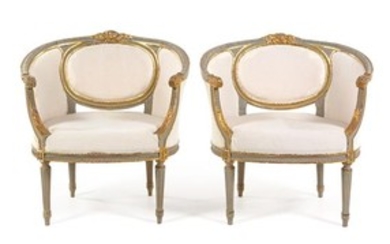 A Pair of Louis XVI Style Painted and Parcel Gilt Bergeres