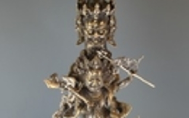 A superb large Tibetan silvered bronze phurba with stand, H. 101cm.