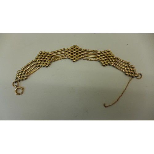 A 9ct yellow gold gate link bracelet, 22cm long, approx 19 g...