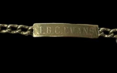 A 9ct yellow gold identity bracelet inscribed 'J.B.C. Evans', length...