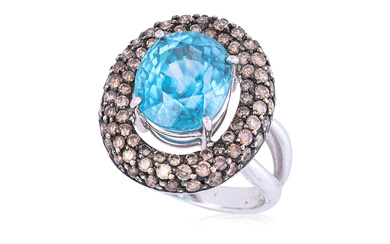 A BLUE ZIRCON AND 'CHAMPAGNE' DIAMOND RING