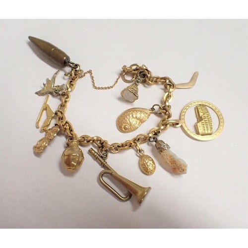 A Bracelet marked 9ct with various charms attached, some 9ct...
