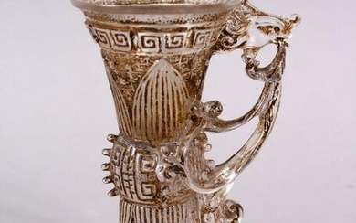 A CHINESE ROCK CRYSTAL STYLE PEKING GLASS CARVED CUP