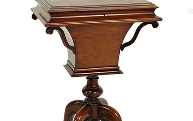 A Carved Mahogany Sewing Table.
