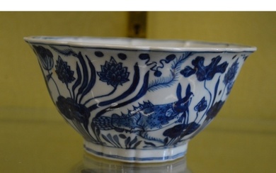 A Chinese blue and white bowl with shaped rim.