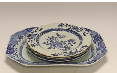 A Chinese blue and white meat plate and three plates, 18th c...