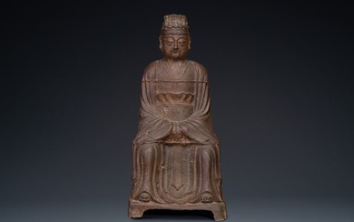 A Chinese cast iron figure of a dignitary, dated 1722
