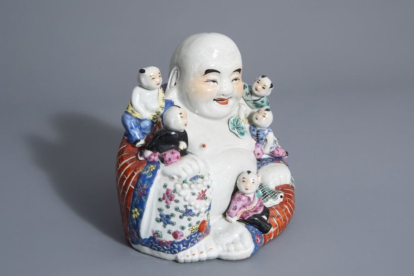 A Chinese famille rose figure of Buddha with...