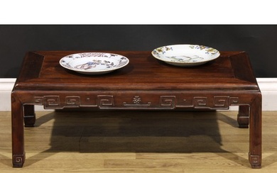 A Chinese hardwood low tea table, panel top, shaped apron ca...