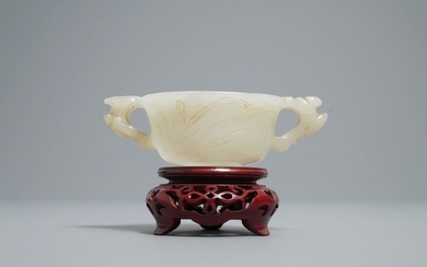 A Chinese pale celadon jade libation cup, 18/19th...