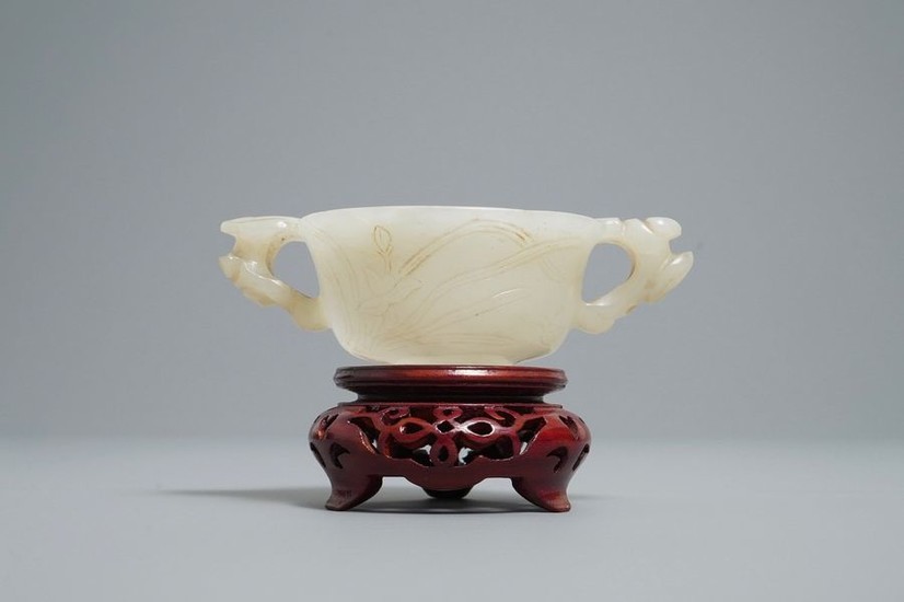 A Chinese pale celadon jade libation cup, 18/19th...