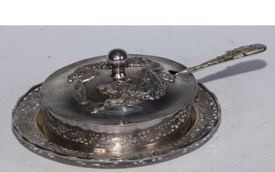 A Chinese silver butter dish, domed cover chased with a drag...