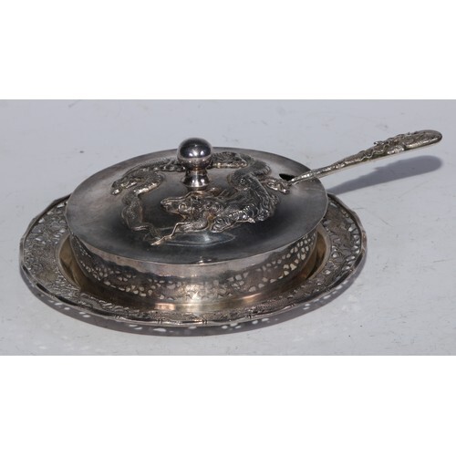 A Chinese silver butter dish, domed cover chased with a drag...