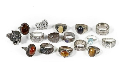 A Collection of Sixteen Sterling Silver Rings.