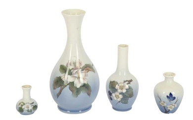 A Copenhagen bottle vase decorated with white blossom