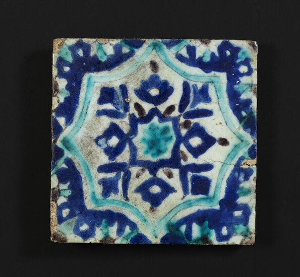 NOT SOLD. A Damascus pottery tile decorated in blue, turquoise and manganese with flowers and design. Syria, 18th century. 22 × 22 cm. – Bruun Rasmussen Auctioneers of Fine Art