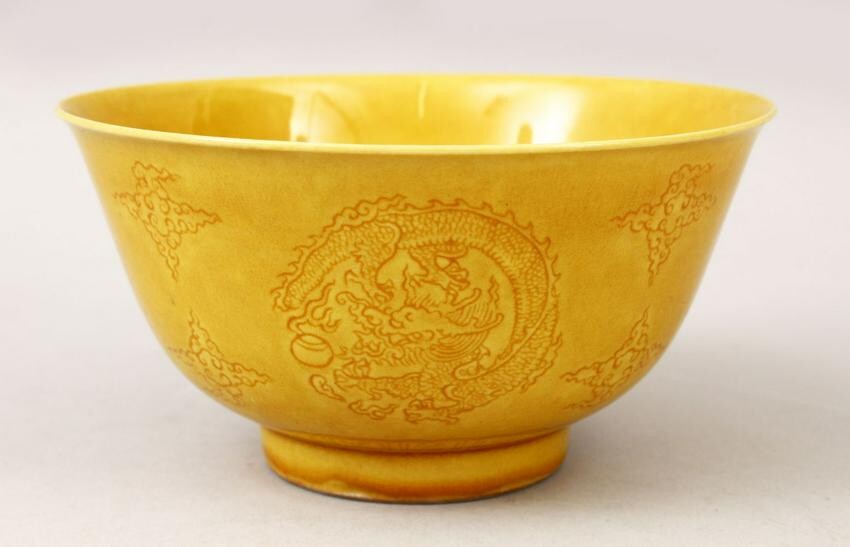 A FINE QUALITY CHINESE YELLOW GROUND INCISED DRAGON