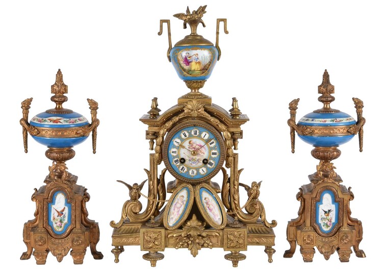 A FRENCH GILT METAL AND PORCELAIN MANTEL CLOCK