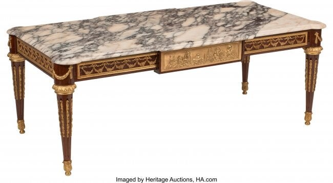 A French Neoclassical Coffee Table with Gilt Bro