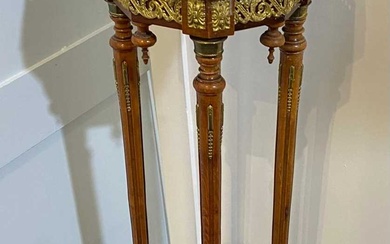 A French gilt metal mounted jardiniere stand