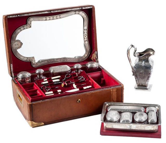 A French silver vanity set with engraved initials,...