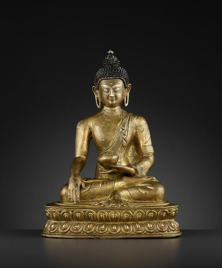 A GILT-BRONZE OF BUDDHA SHAKYAMUNI 17TH CENTURY
