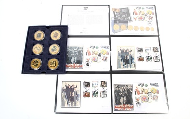 A 'Memories of the Beatles' stamp and coins set. Comprising a boxed set of six 'Spirit of the 60s' gold plated coins and three wallets containing stamps
