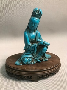 A Old Chinese carved Turquoise Buddha figurine sat upon a ca...