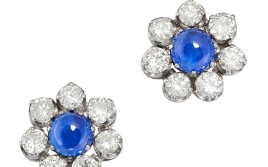 A PAIR OF CEYLON NO HEAT SAPPHIRE AND DIAMOND CLUSTER EARRINGS each set with a round cabochon