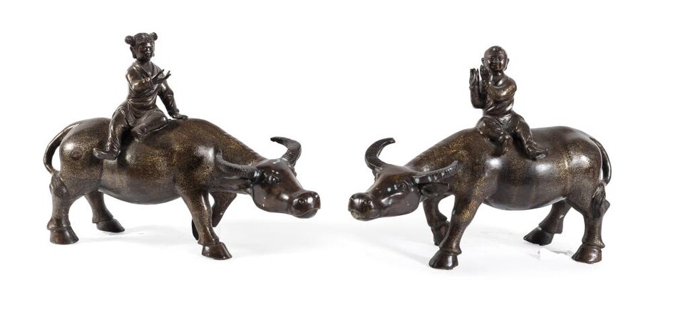 A PAIR OF CHINESE DECORATED BRONZE SCULPTURES OF BUFFALOES WITH CHILDREN. FIRST HALF 20TH CENTURY.