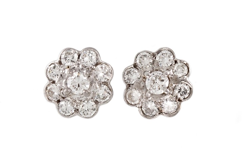 A PAIR OF DIAMOND DAISY CLUSTER EARRINGS, with diamonds of a...