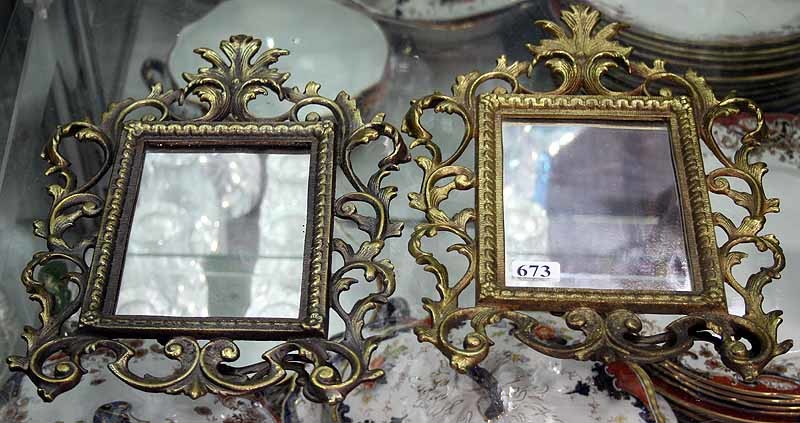 A PAIR OF LATE VICTORIAN BRASS MIRRORS