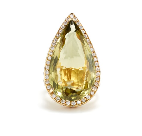 A Peridot, Diamond and Gold Ring