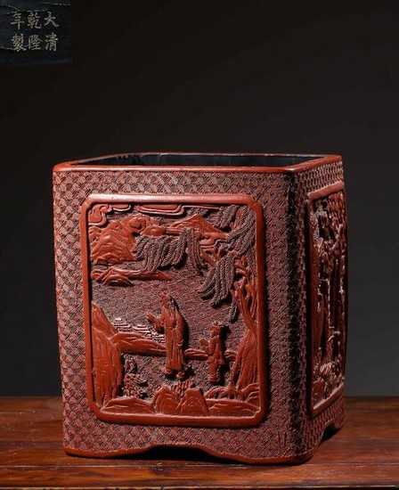 A RED LACQUER BRUSH POT CARVED FIGURE STORY PATTERN