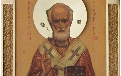 A Russian Icon of St. Nicholas the Wonderworker in Silver, Gilt, Filigree and Gem-set Oklad