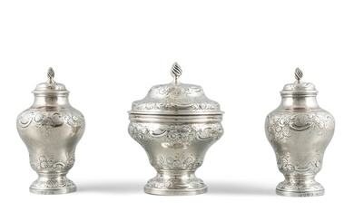 A SUITE OF GEORGE III SILVER TEA CADDIES AND MATCHING MIXING...
