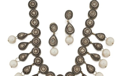 A Turkish diamond and cultured pearl necklace and earrings, designed as a series of gilt-mounted lasque cut diamond circular panels suspending matching pear-shaped panel drops with fresh water cultured pearl terminals, to a chain link back section...