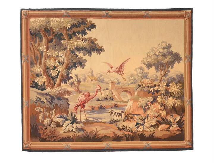 A VERDURE TAPESTRY IN THE EARLY 18TH CENTURY FRANCO-FLEMISH STYLE