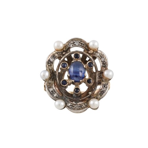 A VINTAGE SAPPHIRE, DIAMOND AND PEARL CLUSTER RING, mounted ...