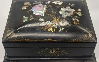 A Victorian black lacquered box inlaid with mother of