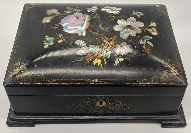 A Victorian black lacquered box inlaid with mother of