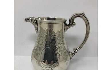 A Victorian silver cream jug, by Charles Stuart Harris, Lond...