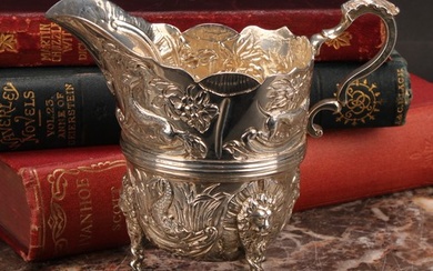 A Victorian silver cream jug, of 18th century Irish design, ...