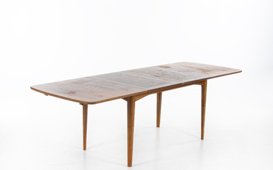 A WALNUT DINING TABLE WITH 2 TABLETOPS, second half of the 20th century.