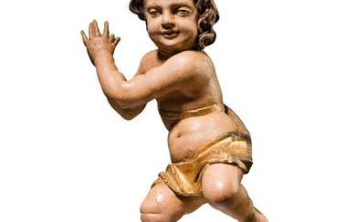 A carved and painted southern German putto, circa 1700